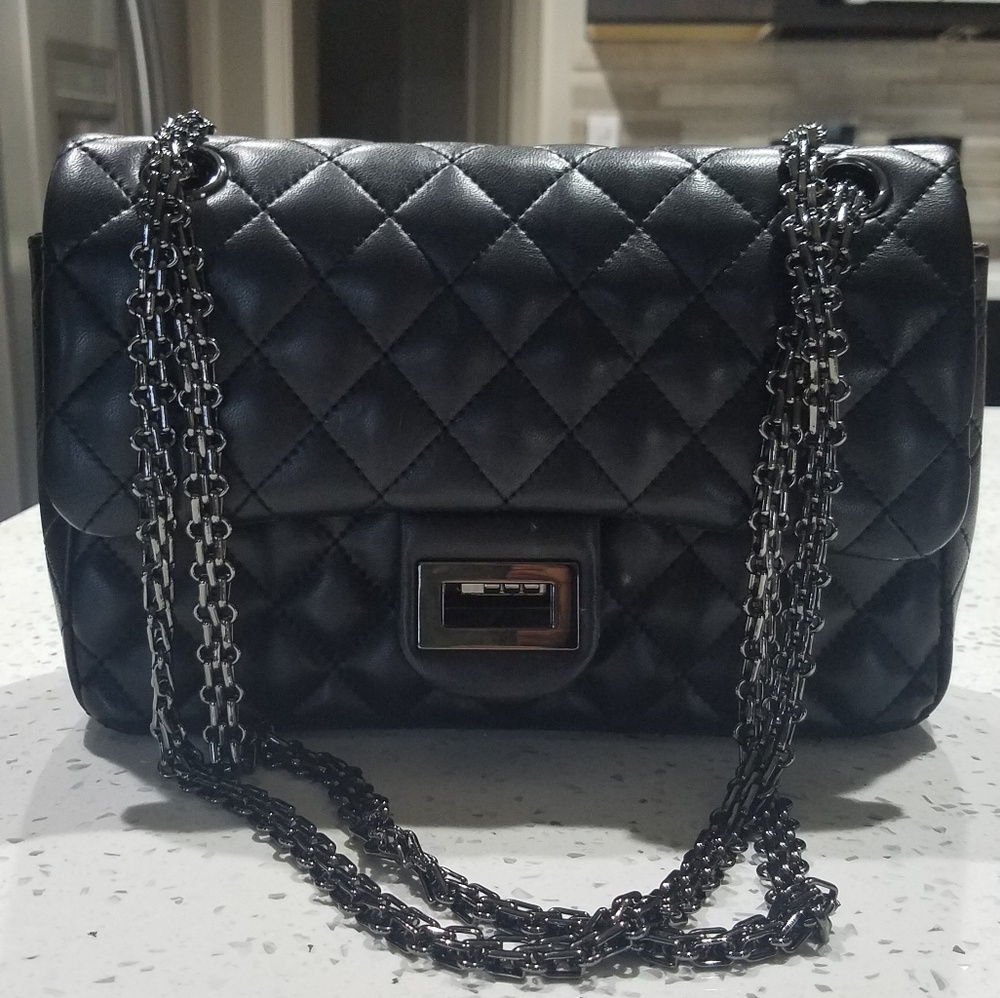 Quilted double flap lambskin handbags